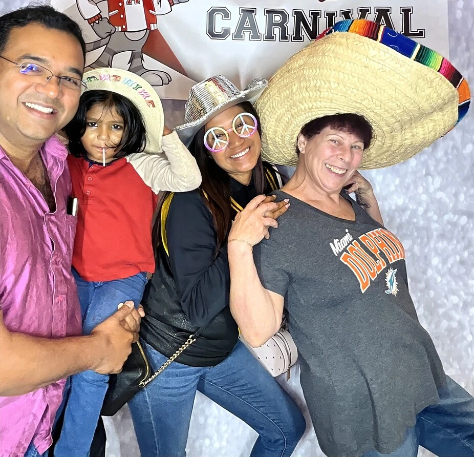 Friends pose at a fiesta-themed celebration.