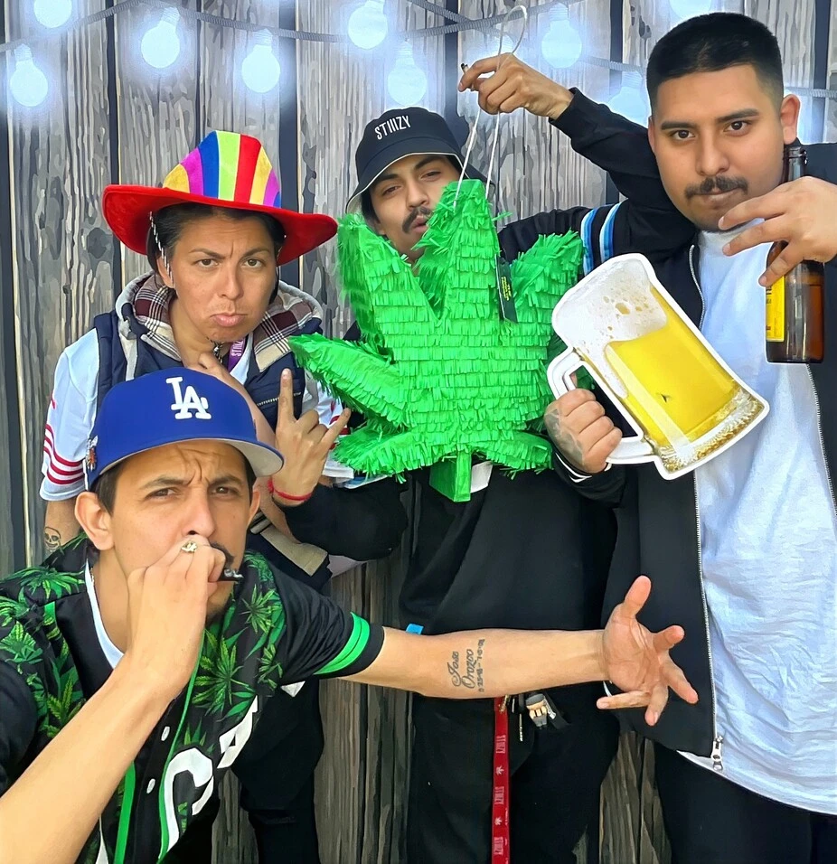Party guests pose at a birthday party.