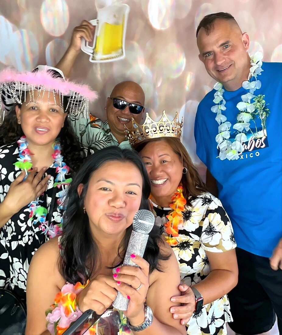 A family poses at a fiesta-themed celebration.