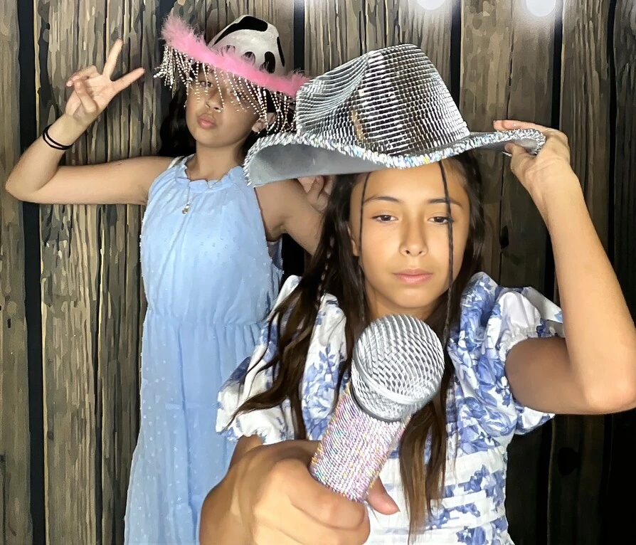 Friends pose at a quinceañera celebration.