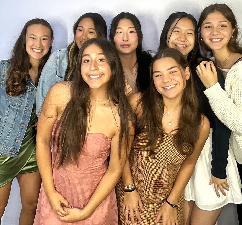 Friends pose at a Sweet 16 celebration.