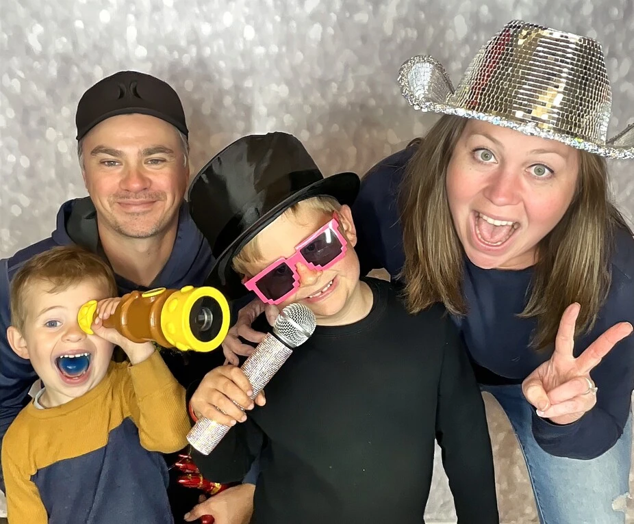 A group of guests poses at a fiesta-themed celebration.