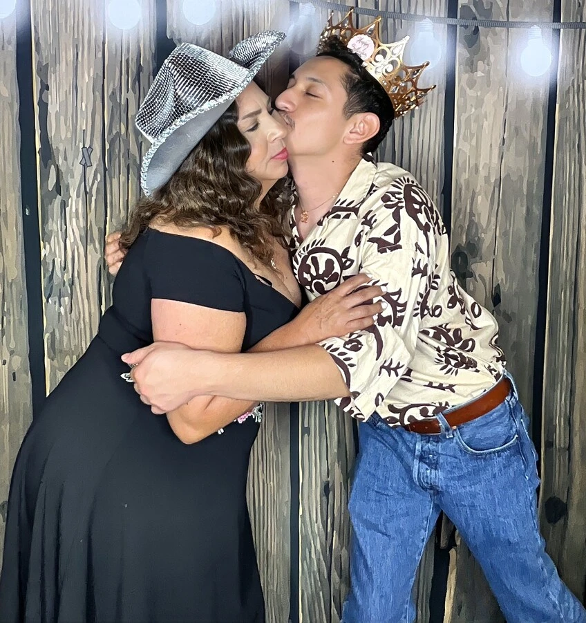 A family poses at a quinceañera celebration.