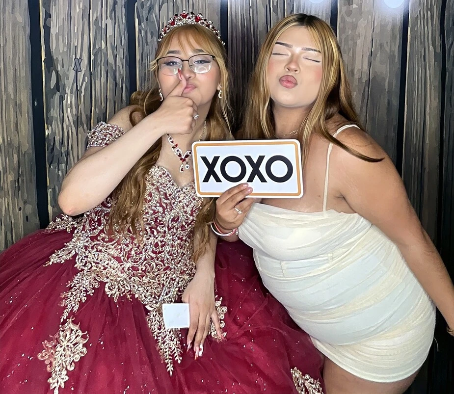 Guests pose at a quinceañera celebration.