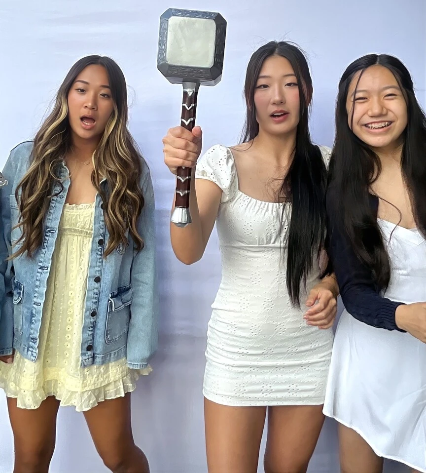 Friends pose at a Sweet 16 celebration.