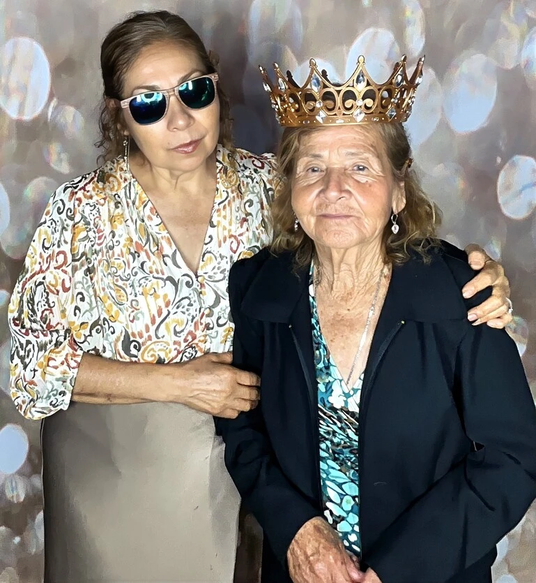 Guests pose at a birthday party.