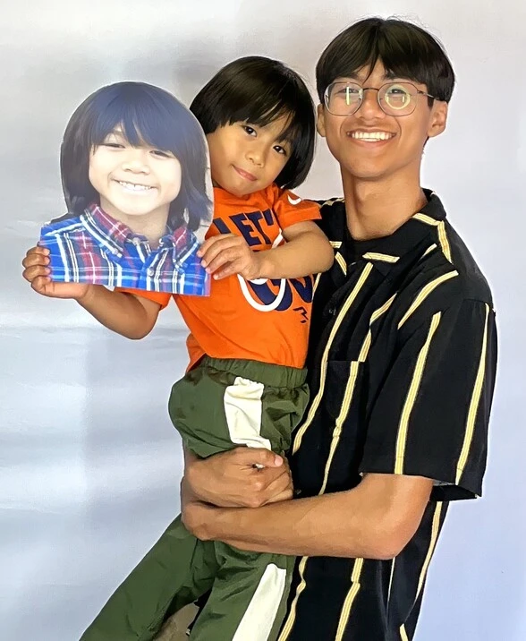 A family poses at a family celebration.