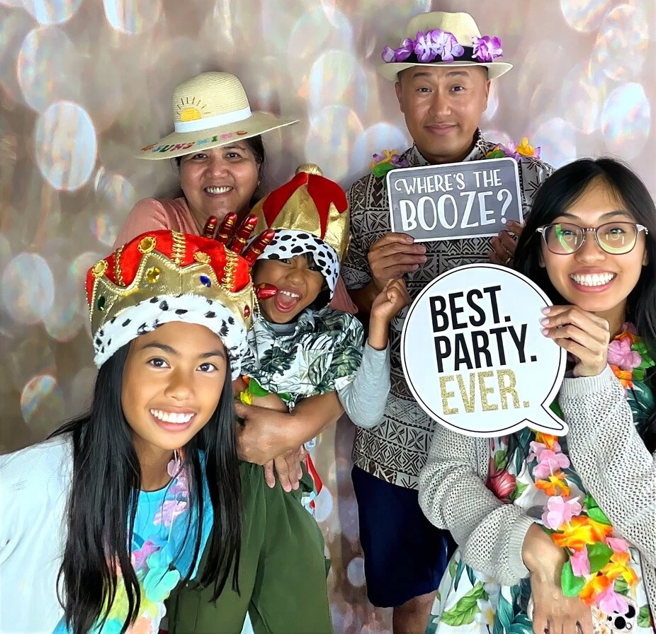 Friends pose at a fiesta-themed celebration.