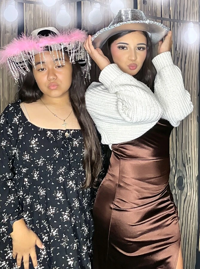 A family poses at a quinceañera celebration.