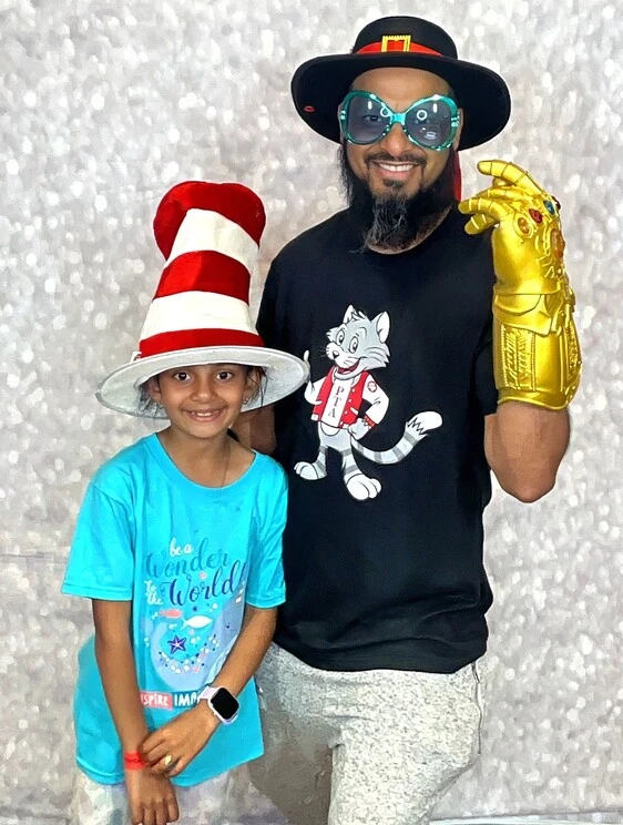 A family poses at a family celebration.