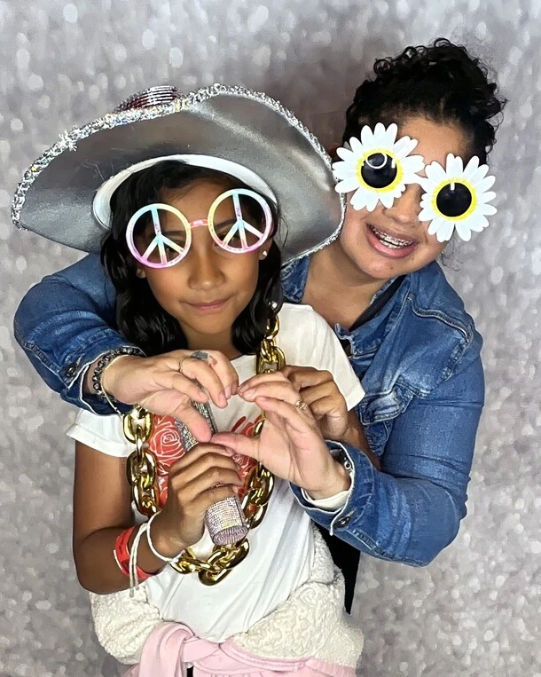 Party guests pose at a fiesta-themed celebration.
