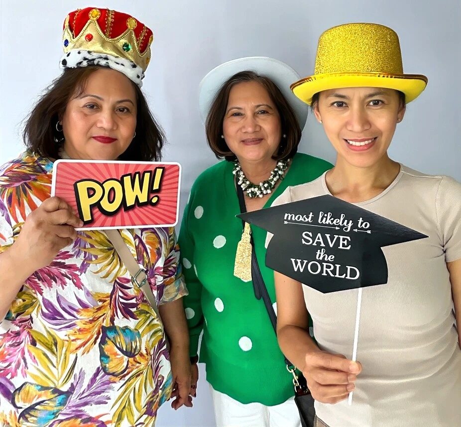 A family poses at a graduation celebration.