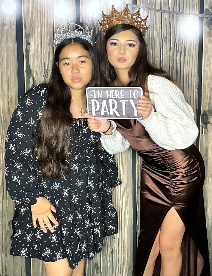 Guests pose at a quinceañera celebration.